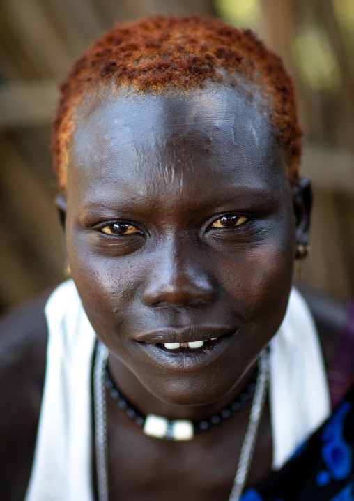 Portrait of a Mundari tribe man with hair dyed in orange with cow urine, Central Equatoria, Terekeka, South Sudan