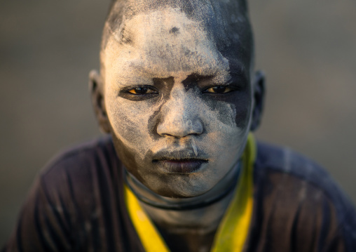 Mundari tribe boy covered in ash to protect from the mosquitoes and flies, Central Equatoria, Terekeka, South Sudan