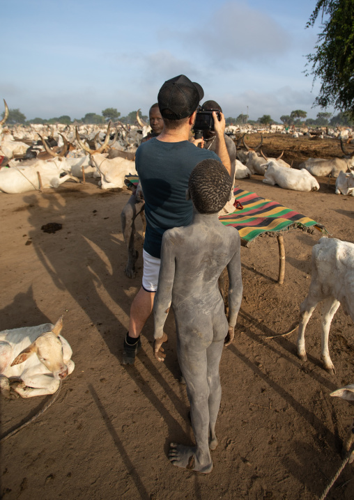 Tourist taking pictures in Mundari tribe, Central Equatoria, Terekeka, South Sudan