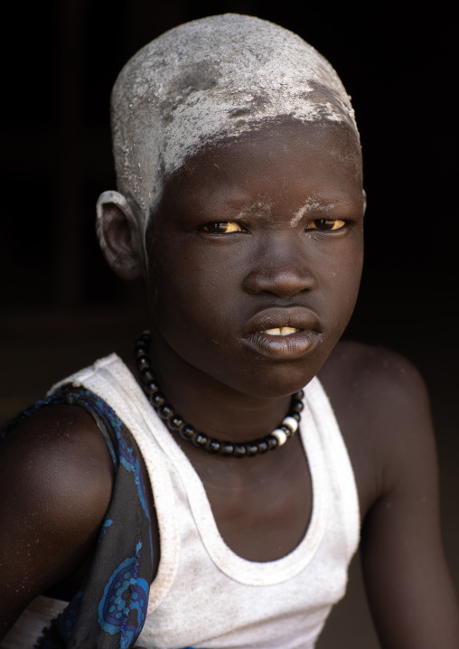 Portrait of a Mundari girl with ash on the head to dye her hair in red, Central Equatoria, Terekeka, South Sudan