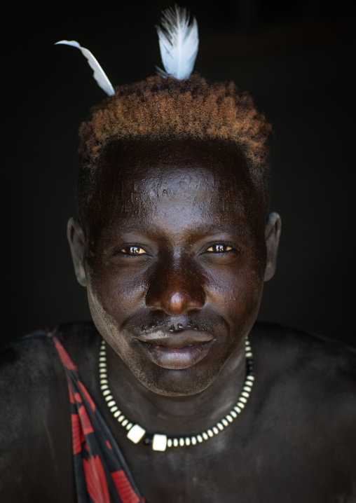 Portrait of a Mundari tribe man with hair dyed in orange with cow urine, Central Equatoria, Terekeka, South Sudan