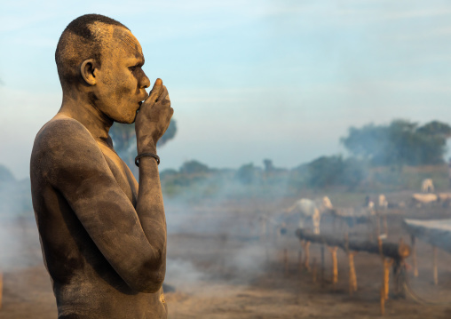 Mundari tribe man covered in ash to repel flies and mosquitoes, Central Equatoria, Terekeka, South Sudan