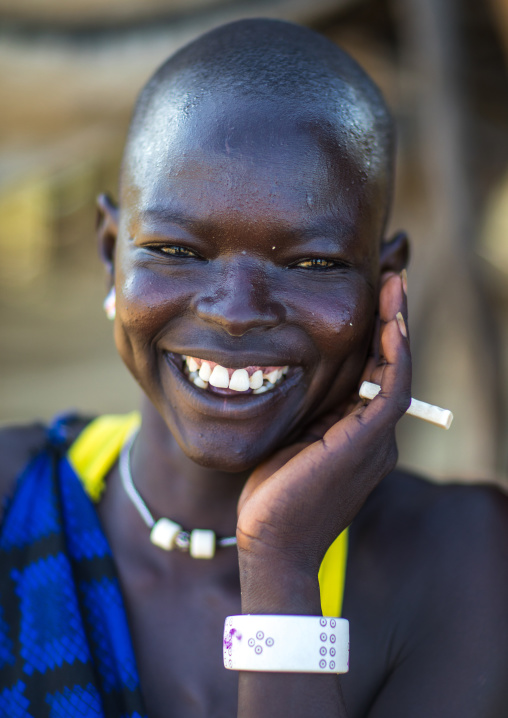 Portrait of a smiling Mundari tribe woman, Central Equatoria, Terekeka, South Sudan