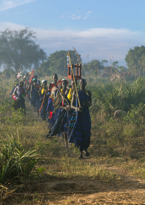 Mundari tribe women marching in line while celebrating a wedding, Central Equatoria, Terekeka, South Sudan