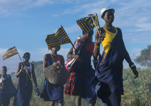 Mundari tribe women marching in line while celebrating a wedding, Central Equatoria, Terekeka, South Sudan