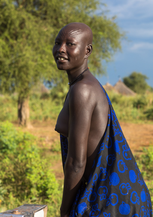 Mundari tribe woman pumping water in a well, Central Equatoria, Terekeka, South Sudan