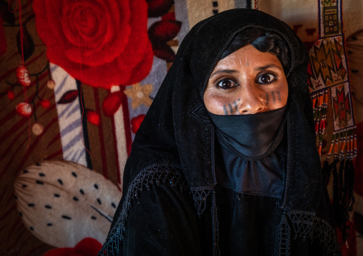 Portrait of a Rashaida tribe veiled woman inside her tent, Kassala State, Kassala, Sudan