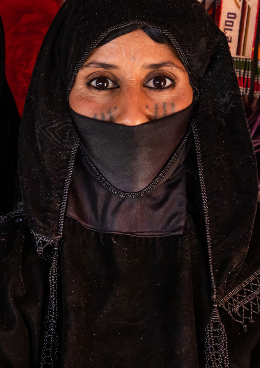 Portrait of a Rashaida tribe veiled woman inside her tent, Kassala State, Kassala, Sudan