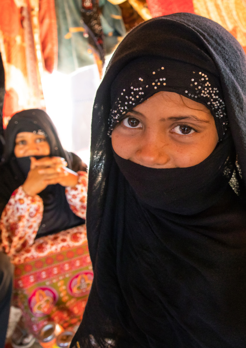 Portrait of Rashaida tribe veiled girl inside her tent, Kassala State, Kassala, Sudan