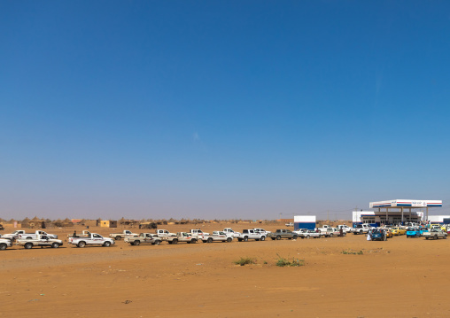 Sudanese people in their cars queue on line at a gas station during the fuel shortages, Kassala State, Kassala, Sudan