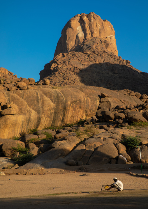 Sudanese sufi man praying at the foot of Taka mountains, Kassala State, Kassala, Sudan