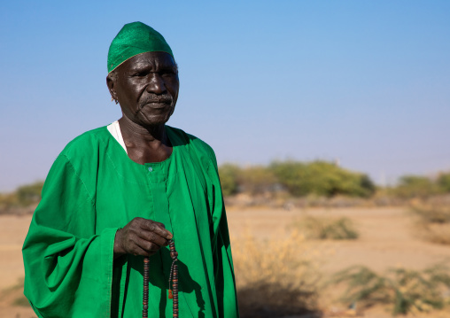 Sufi dervish in green clothes, Al Jazirah, Abu Haraz, Sudan