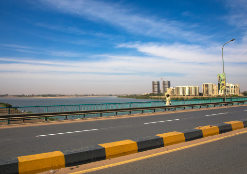 Sudanese man crossing a bridge over river Nile, Khartoum State, Khartoum, Sudan