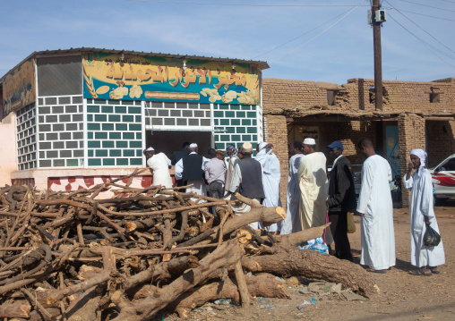 Sudanese people queue on line at a bakery during the crisis, Northern State, Karima, Sudan