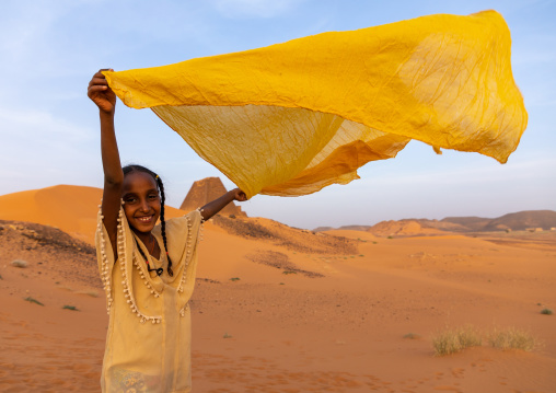 Portrait of sudanese girl visiting the pyramids of the kushite rulers at Meroe, Northern State, Meroe, Sudan