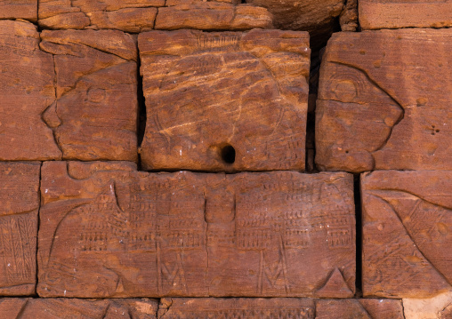 Three-headed Apedemak with four arms in lion temple of Apedemak, Nubia, Naqa, Sudan