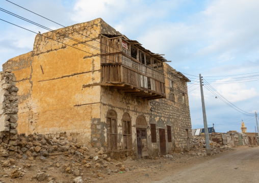 Old building with a wooden balcony on mainland, Red Sea State, Suakin, Sudan