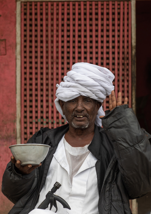 Portrait of a Beja tribe man in a restaurant, Red Sea State, Port Sudan, Sudan