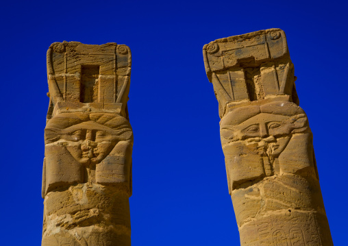 Sudan, Northern Province, Karima, hatoric style columns in the outer courtyard of the temple of amun and mut at the base of the jebel barkal