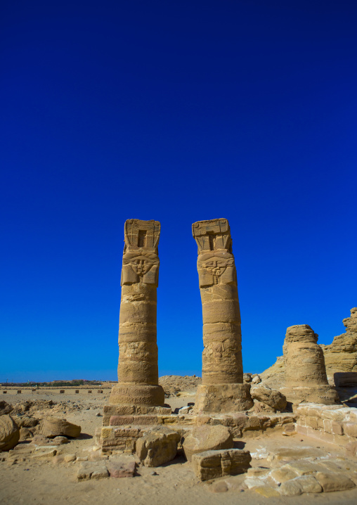 Sudan, Northern Province, Karima, hatoric style columns in the outer courtyard of the temple of amun and mut at the base of the jebel barkal