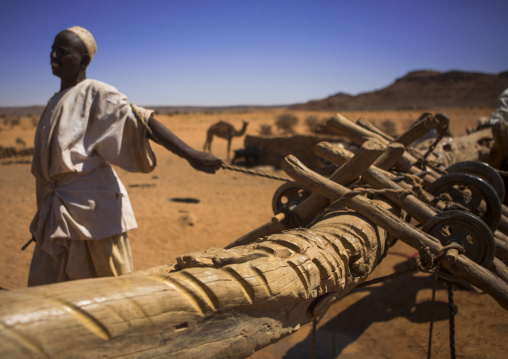 Sudan, Nubia, Naga, people taking water from a well in the desert