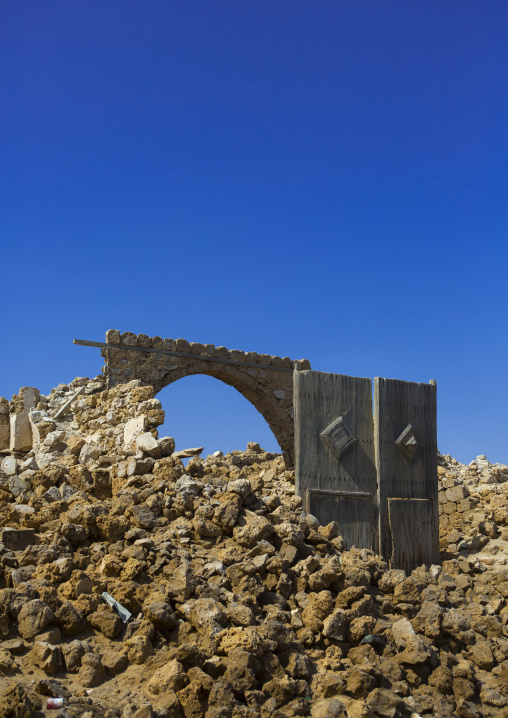 Sudan, Port Sudan, Suakin, wodden door in the middle of a ruined ottoman coral buildings