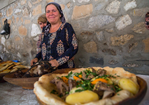 Tajik women selling food in the market border with Afghanistan, Central Asia, Ishkashim, Tajikistan