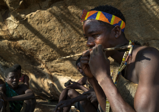 Tanzania, Serengeti Plateau, Lake Eyasi, hadzabe tribe making an arrow