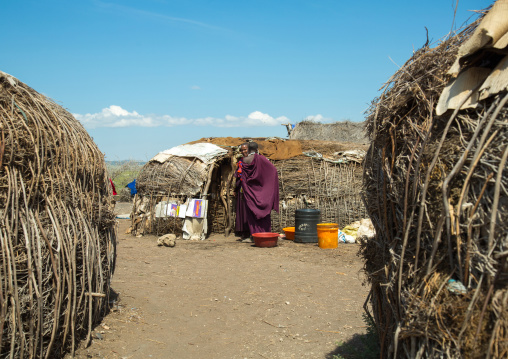 Tanzania, Ashura region, Ngorongoro Conservation Area, maasai couple outside their home