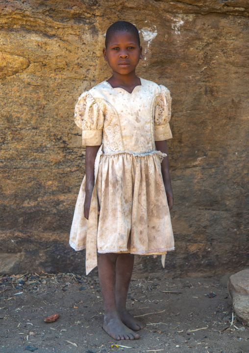 Tanzania, Serengeti Plateau, Lake Eyasi, hadzabe tribe girl with modern clothes