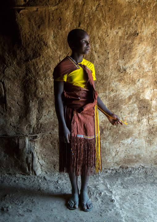 Tanzania, Serengeti Plateau, Lake Eyasi, datoga tribe woman wearing a leather dress