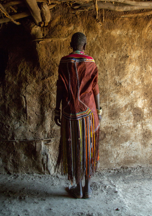 Tanzania, Serengeti Plateau, Lake Eyasi, datoga tribe woman wearing a leather dress