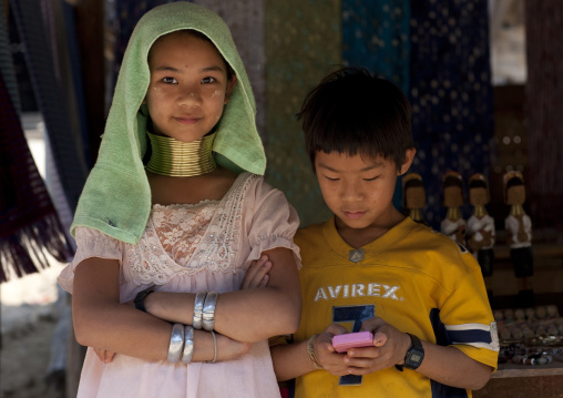 Miss mujee and her brother from karen long neck tribe, Mae hong son area, Thailand