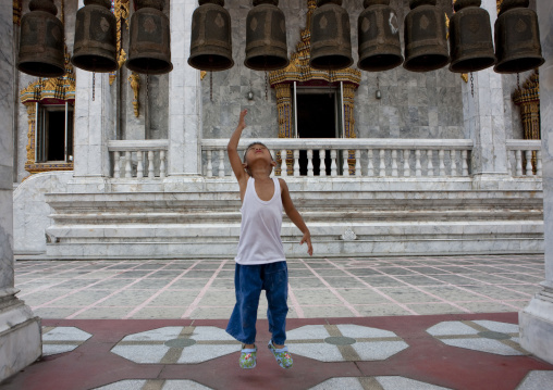 Ringing bells in buddhist temple, Bangkok, Thailand