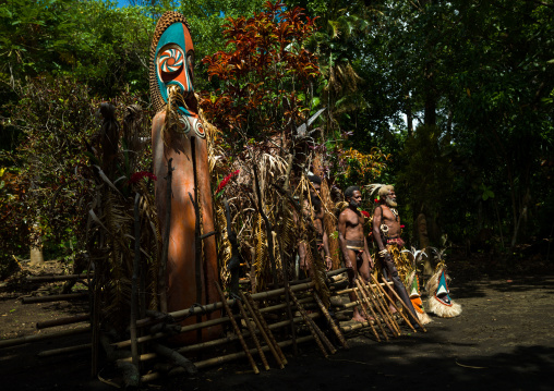 Portrait of chieftain Etul on the Rom dance area in front of a giant slit drum, Ambrym island, Fanla, Vanuatu