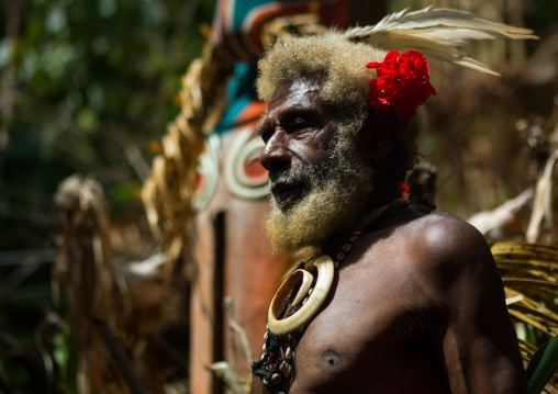 Portrait of chieftain Etul in front of a giant slit drum, Ambrym island, Fanla, Vanuatu