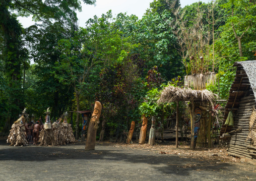 Rom dance masks and giant slit drum during a ceremony, Ambrym island, Fanla, Vanuatu