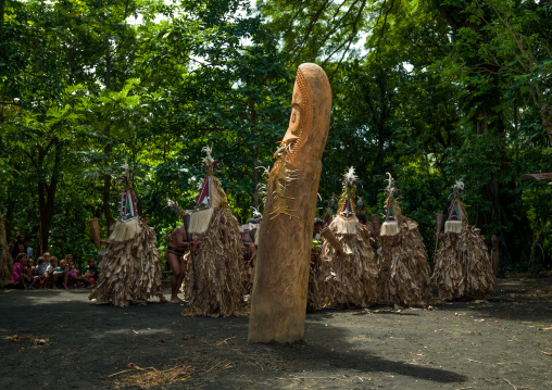 Rom dance masks and giant slit drum during a ceremony, Ambrym island, Fanla, Vanuatu