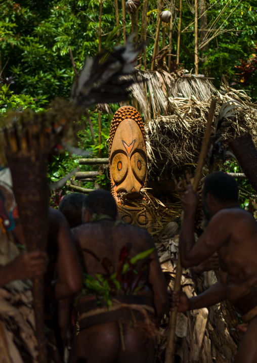 Rom dance masks and giant slit drum during a ceremony, Ambrym island, Fanla, Vanuatu