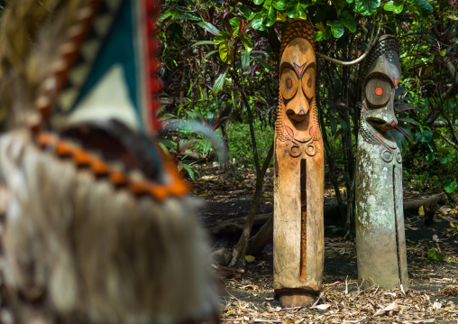 Rom dance masks and giant slit drum during a ceremony, Ambrym island, Fanla, Vanuatu