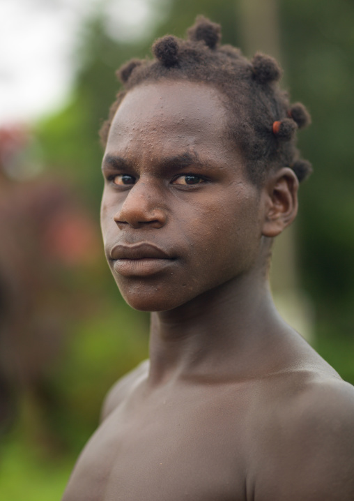 Ni-Vanuatu young man with a special hairstyle, Sanma Province, Espiritu Santo, Vanuatu