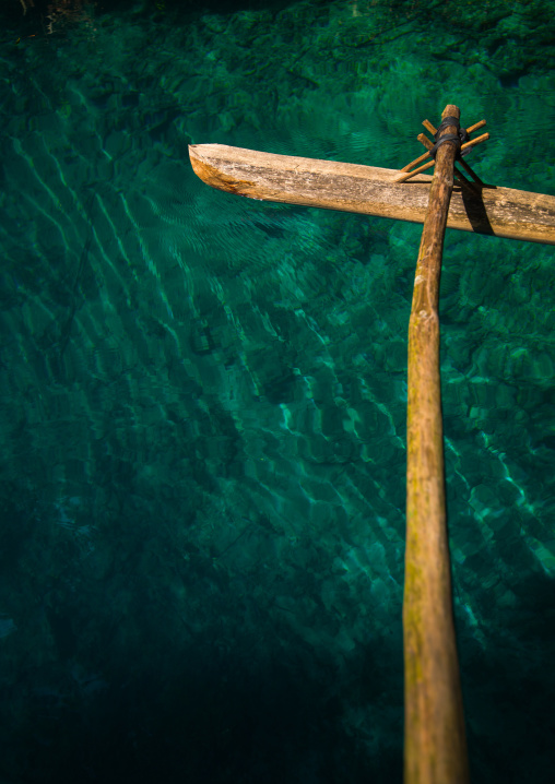 Dugout boat on a green water river, Sanma Province, Espiritu Santo, Vanuatu