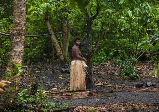 Topless woman with a traditional grass skirt, Tanna island, Yakel, Vanuatu