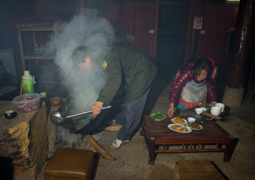 Couple cooking in their kitchen, Sapa, Vietnam