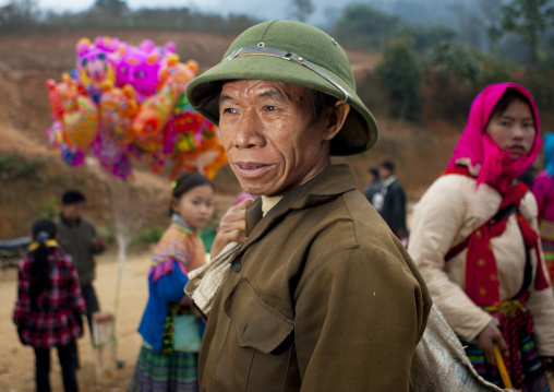 Man with a colonial hat on a market place, Sapa, Vietnam