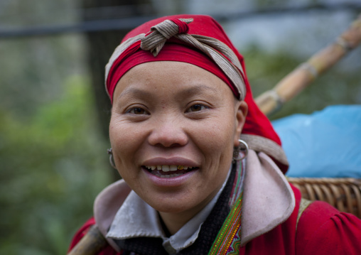 Red dzao woman with a red headscarf, Sapa, Vietnam