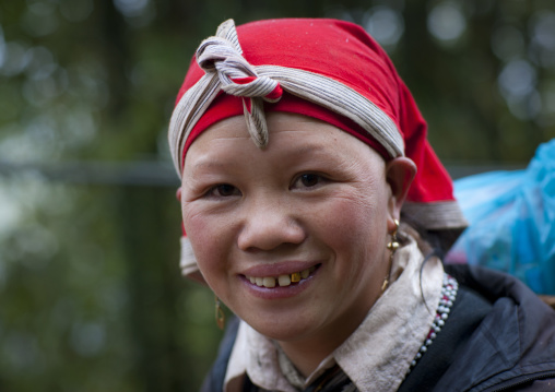 Red dzao woman with a red headscarf, Sapa, Vietnam