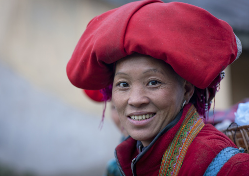 Red dzao woman with a red headgear, Sapa, Vietnam