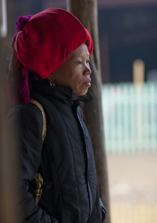 Red dzao woman with a red headgear, Sapa, Vietnam