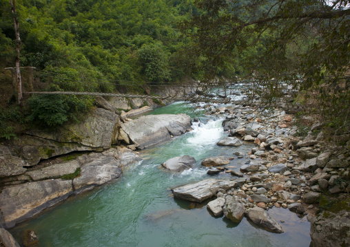 Suspension bridge over a river, Sapa, Vietnam